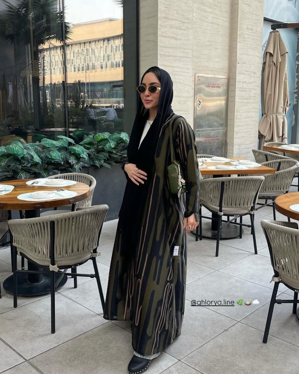 Ghlorya patterned abaya styled outdoors