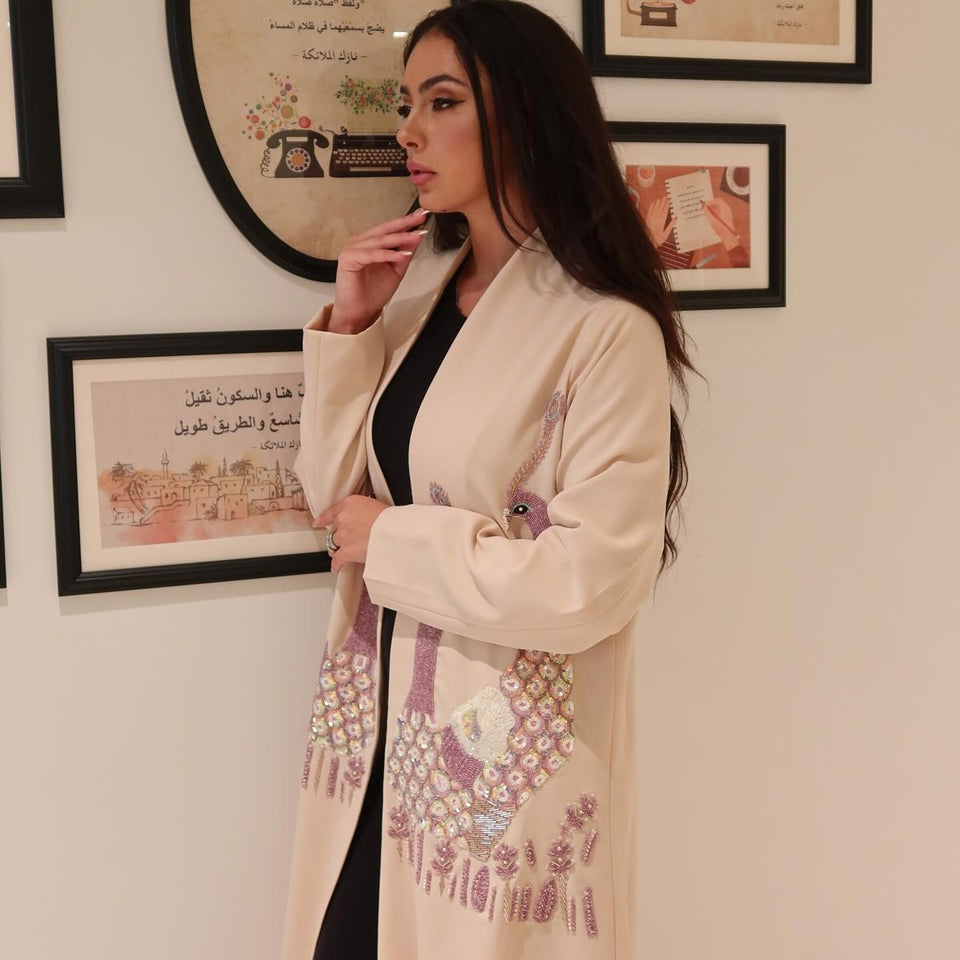 Cream Ghlorya abaya with peacock embroidery