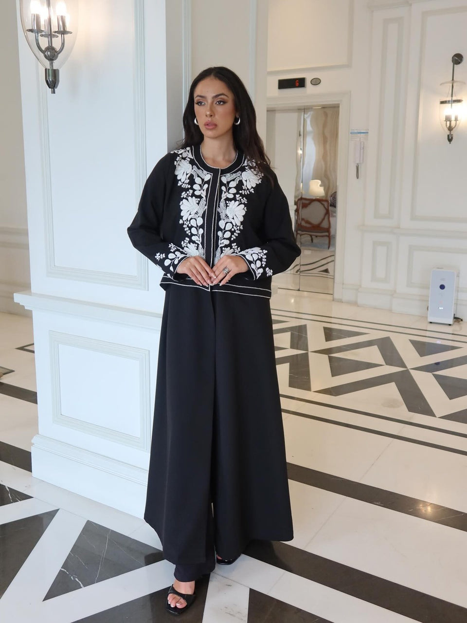 Black Ghlorya abaya with white floral embroidery