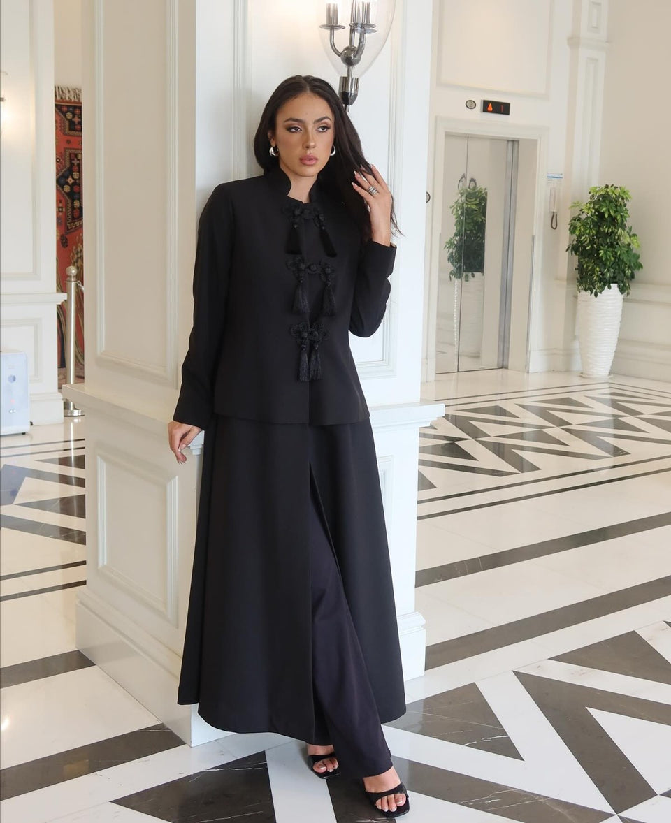 Black Ghlorya abaya with tassel fastenings