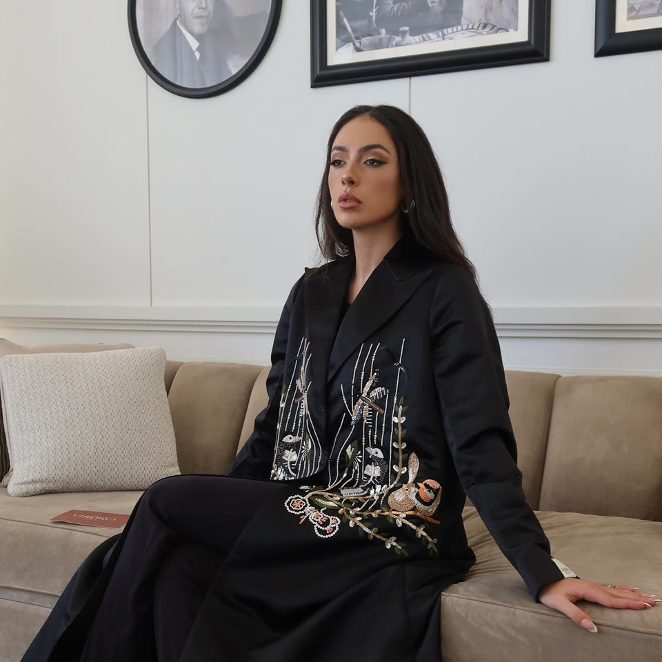 Ghlorya embroidered black abaya styled seated