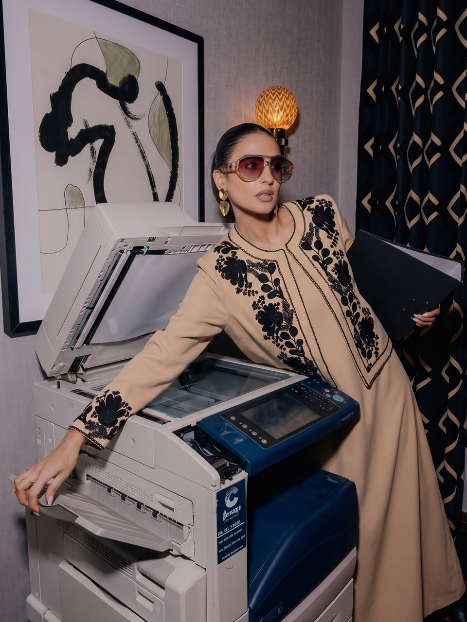 Beige Ghlorya abaya with black floral embroidery