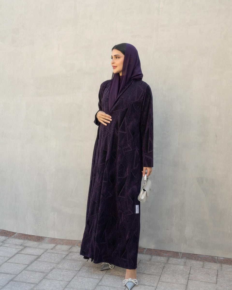Purple textured abaya styled outdoors
