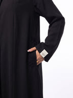 Safa embroidered side pocket and sleeve detail